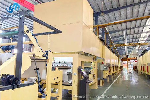 Bagaimana cara memastikan penghematan energi yang efisien dan pengoperasian lini impregnasi secara otomatis dalam proses produksi?